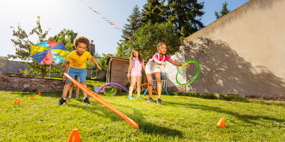 Group,Of,Kids,Play,Game,Throwing,Hula,Rings