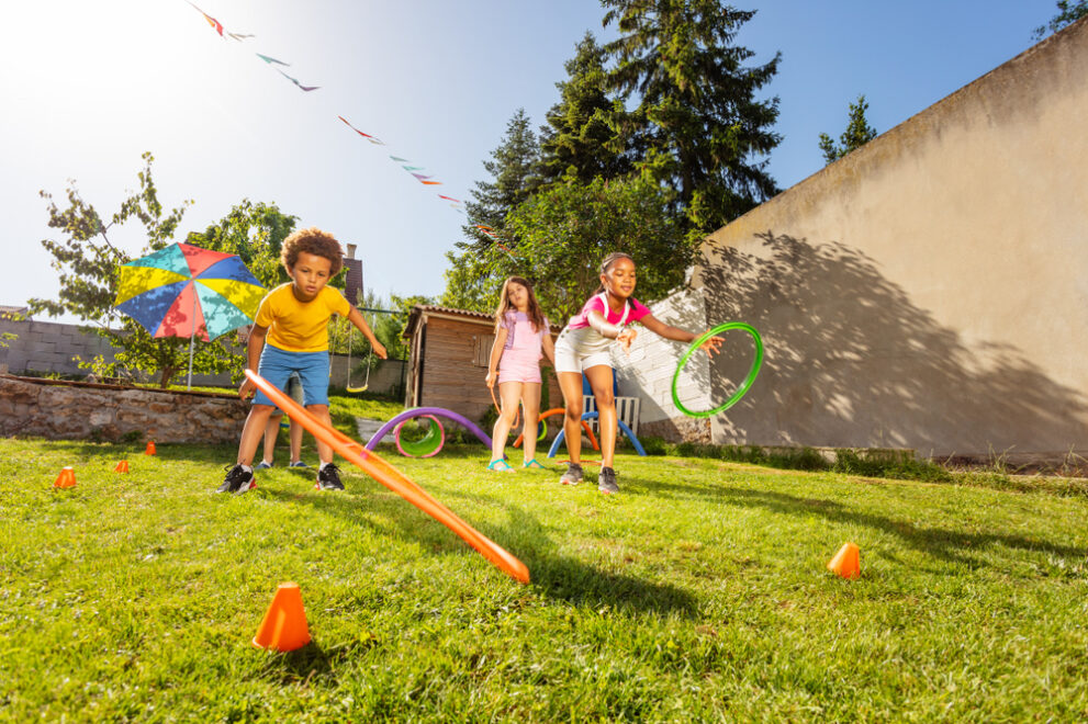 Group,Of,Kids,Play,Game,Throwing,Hula,Rings