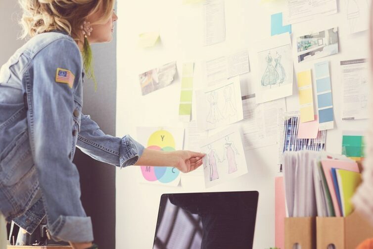 Fashion,Designer,Woman,Working,On,Her,Designs,In,The,Studio