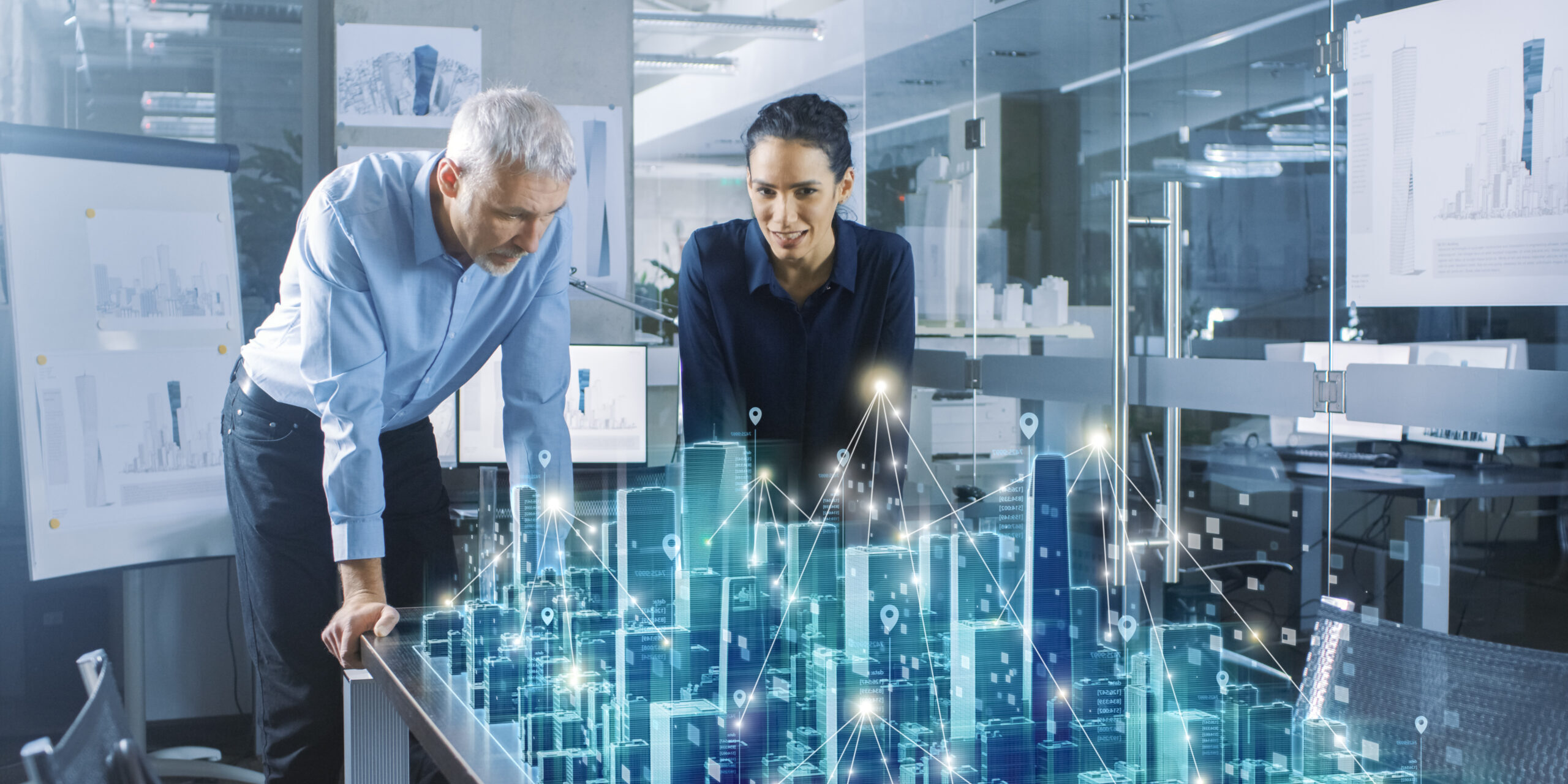 Male,And,Female,Architects,Work,With,Holographic,Augmented,Reality,3d