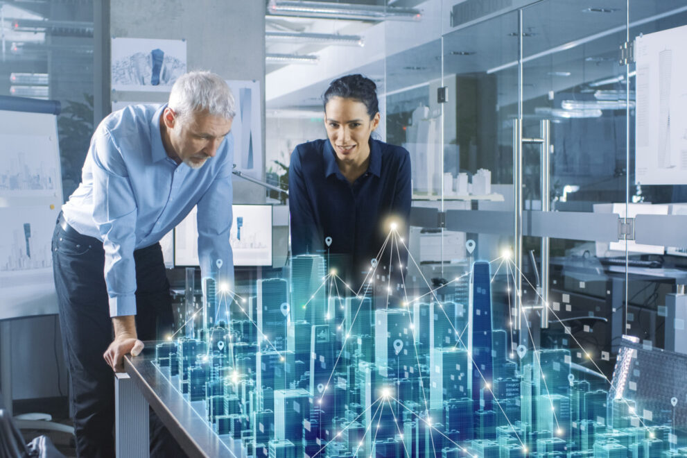 Male,And,Female,Architects,Work,With,Holographic,Augmented,Reality,3d